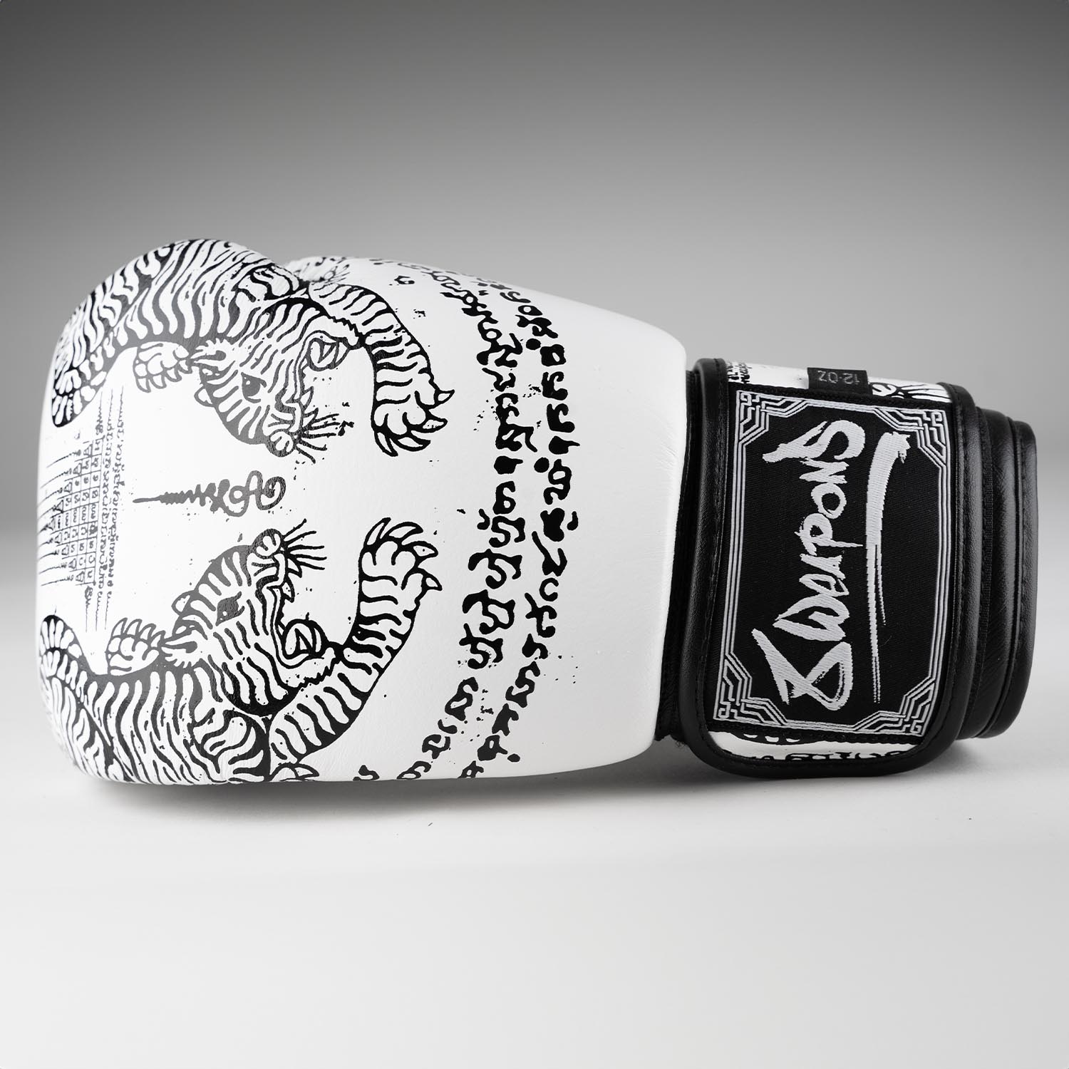 8 WEAPONS Boxing Gloves, Sak Yant Tigers, white-black, 12 Oz