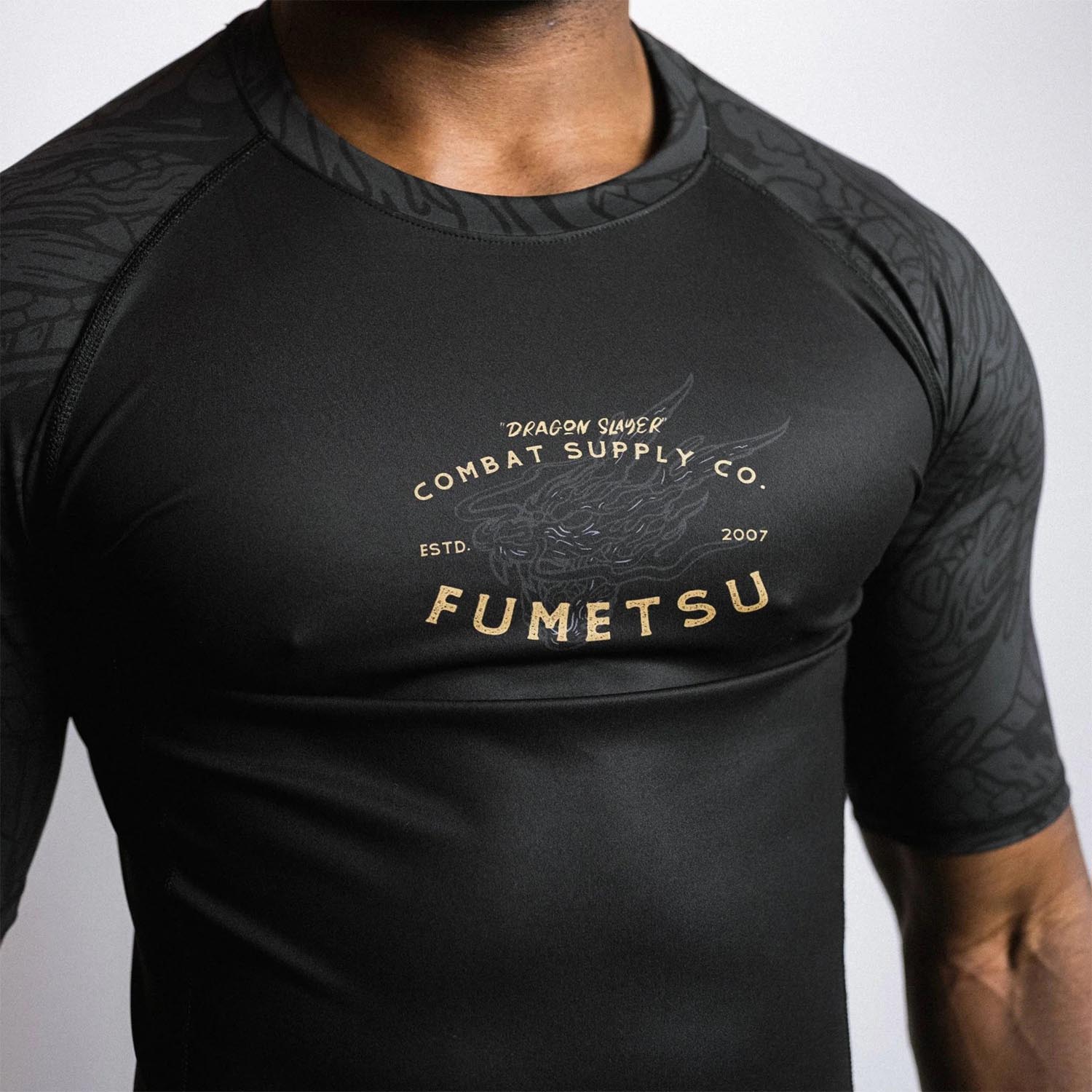 Fumetsu Rashguard, S/S, Dragon Slayer, black-gold, XXL