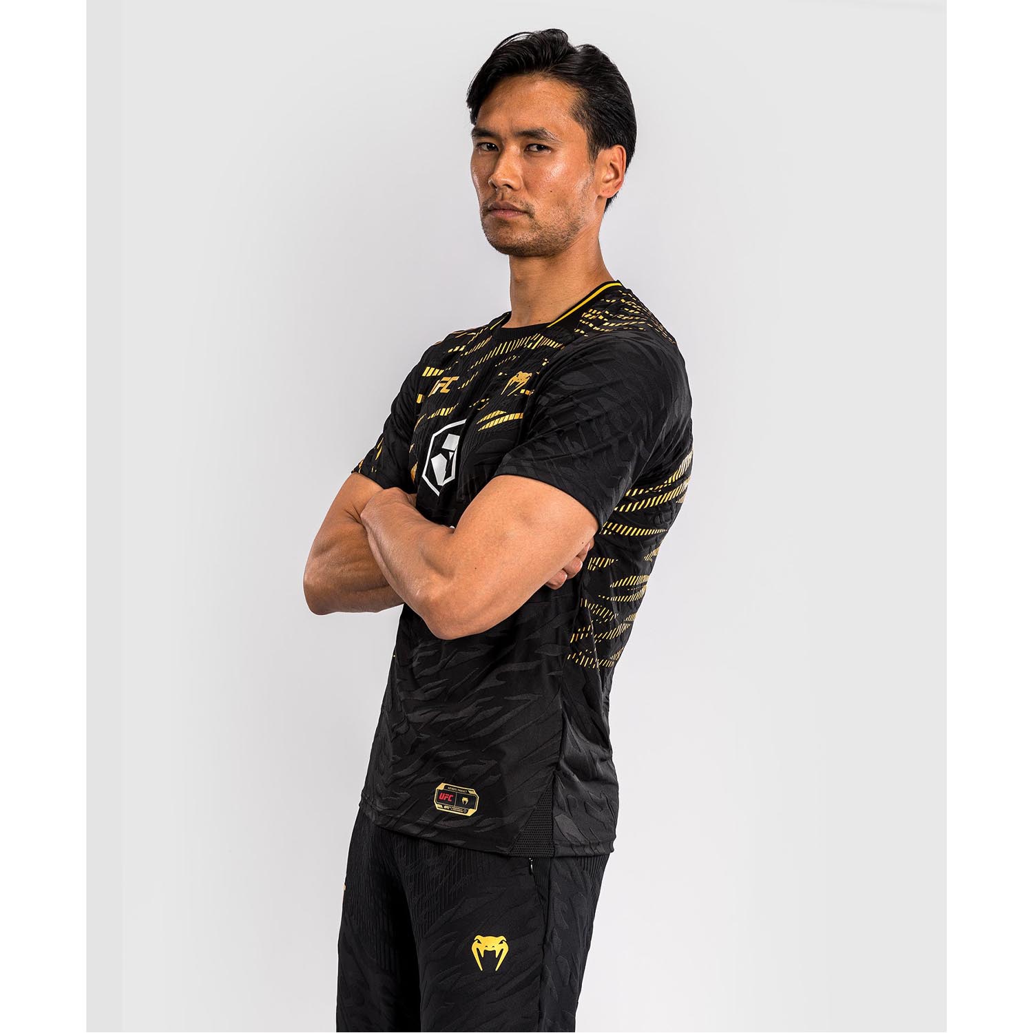VENUM Dry Tech T-Shirt, UFC Fusion Authentic Fight Night Champion, schwarz-gold, S